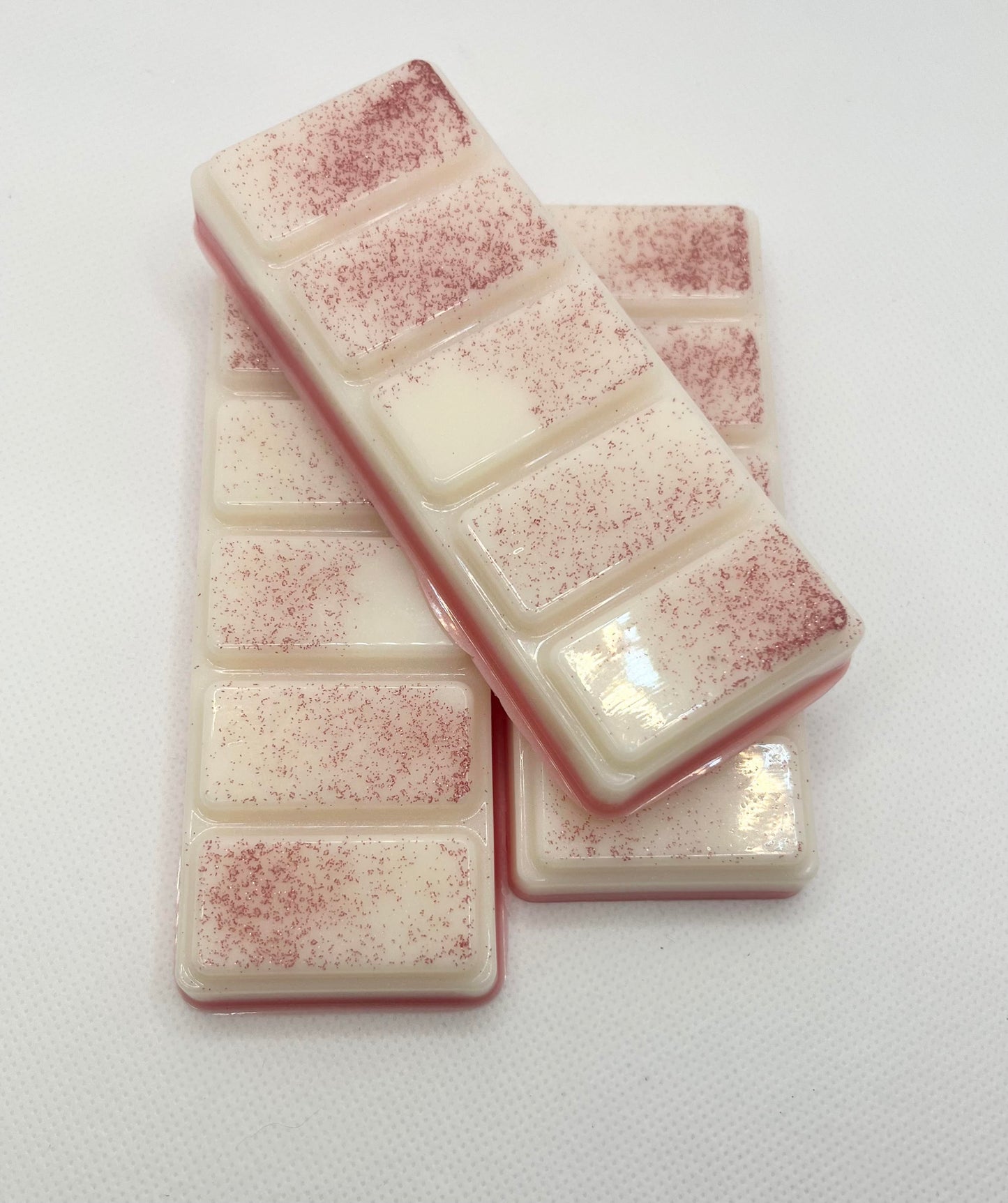 Image of 3 English Pear & Freesia, soy wax melt snap bars in a Lucious cream colour infused with red glitter